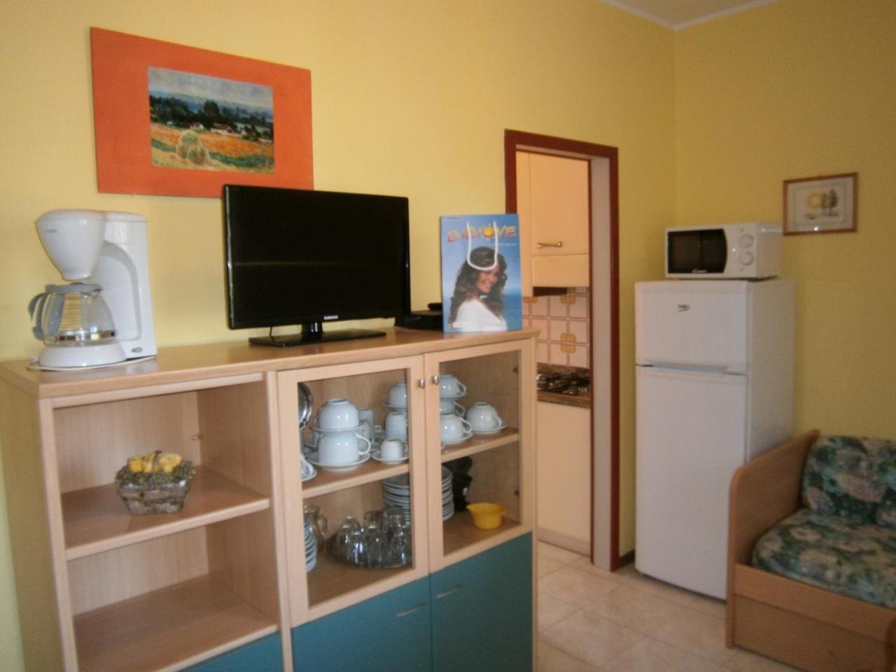 Azzurro Apartment Бибионе Екстериор снимка