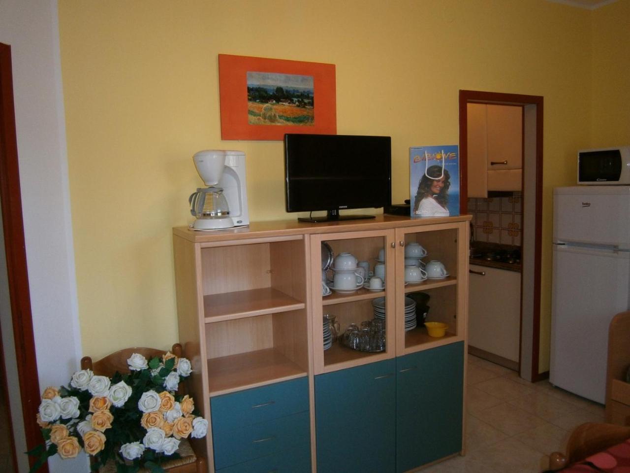 Azzurro Apartment Бибионе Екстериор снимка
